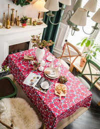 Mantel navideño festivo con estampado floral rojo