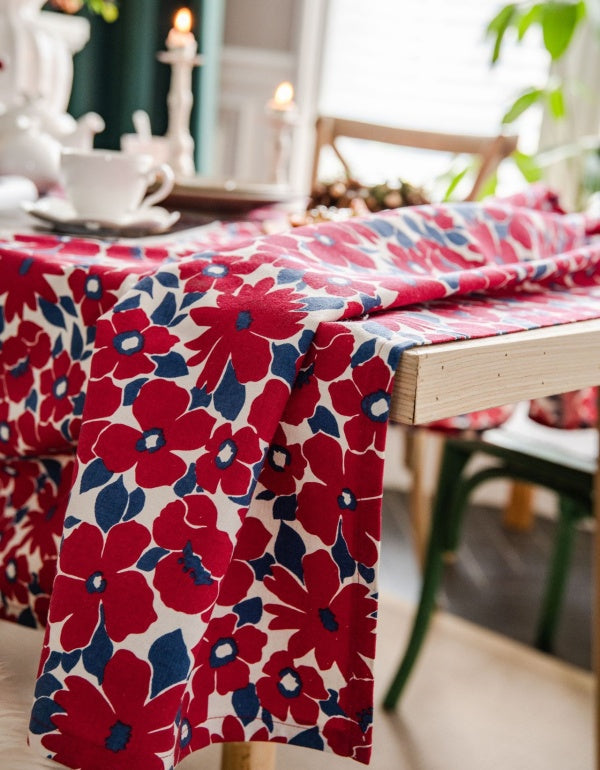 Mantel navideño festivo con estampado floral rojo