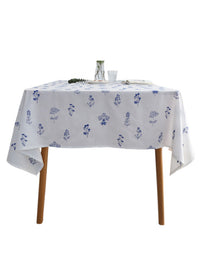 Nappe en lin brodée de fleurs bleues 