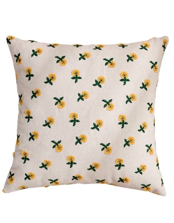 Housse de coussin brodée marguerite