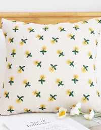 Housse de coussin brodée marguerite