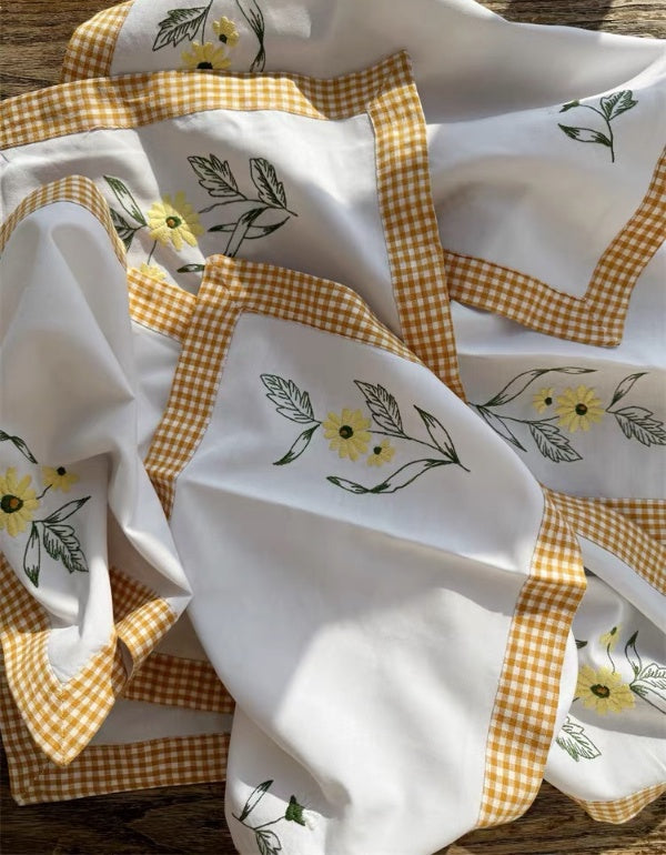 Serviettes en tissu brodées à motif de marguerites pastorales