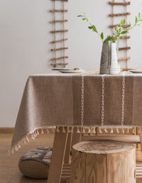 Nappe en coton et lin avec bordure à pompons 