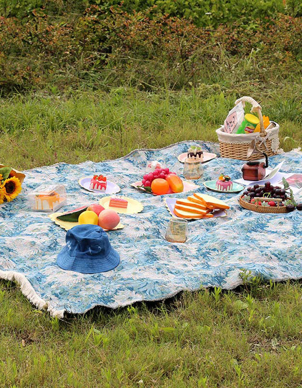 Manta de picnic para exteriores con borlas y estampado de flores azules