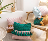 Housse de coussin à pompons en tricot de style ethnique