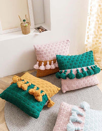 Housse de coussin à pompons en tricot de style ethnique