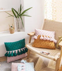 Housse de coussin à pompons en tricot de style ethnique