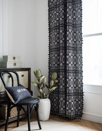 Rideaux Boho à pompons géométriques noirs en jacquard poly-coton