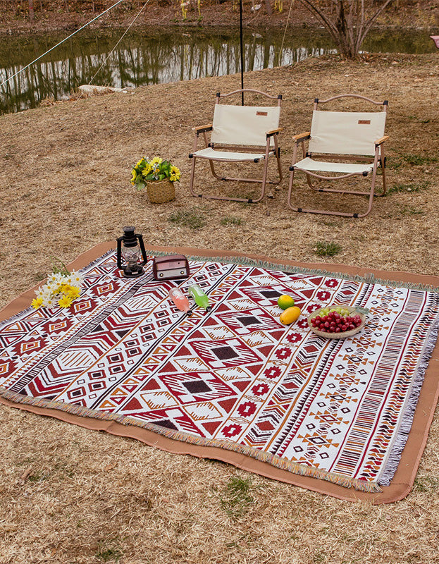 Manta de picnic con borlas y diseño de flores estilo pastoral