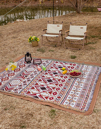 Manta de picnic con borlas y diseño de flores estilo pastoral